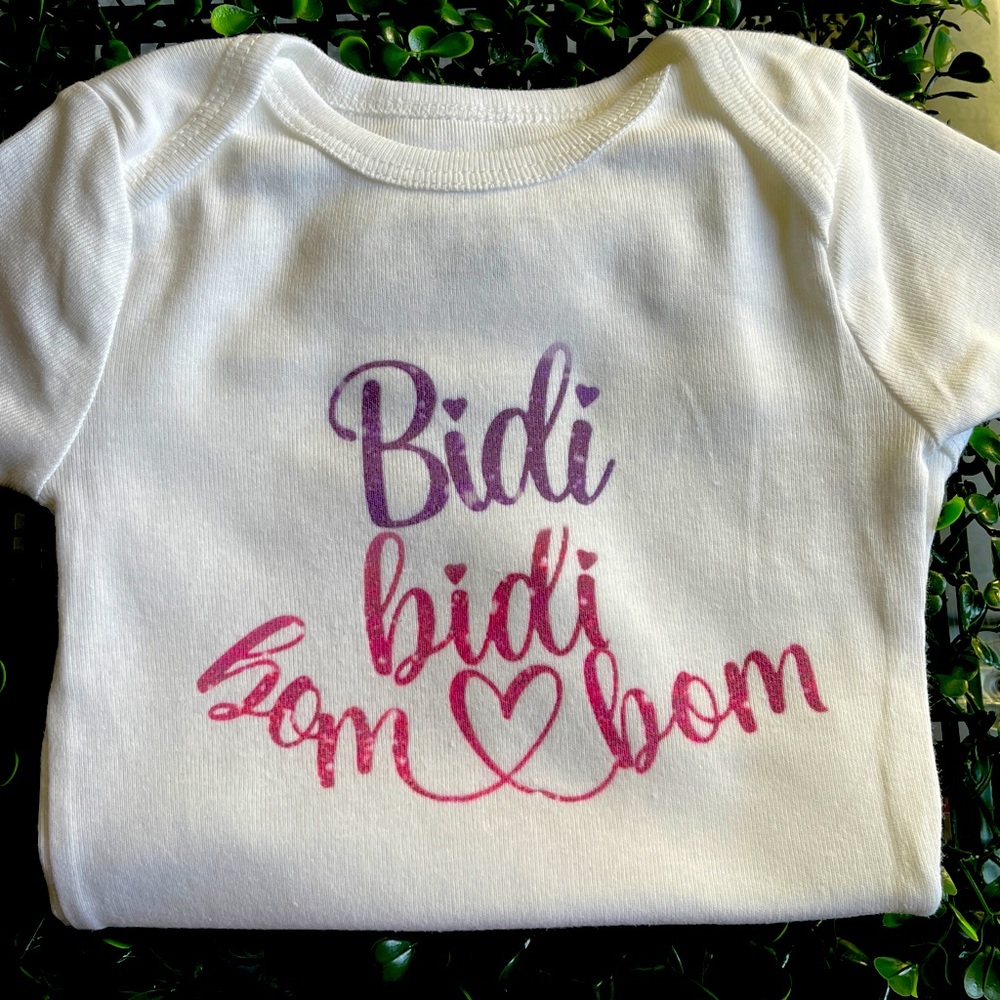 Size 3-6 months Selena baby onsie
